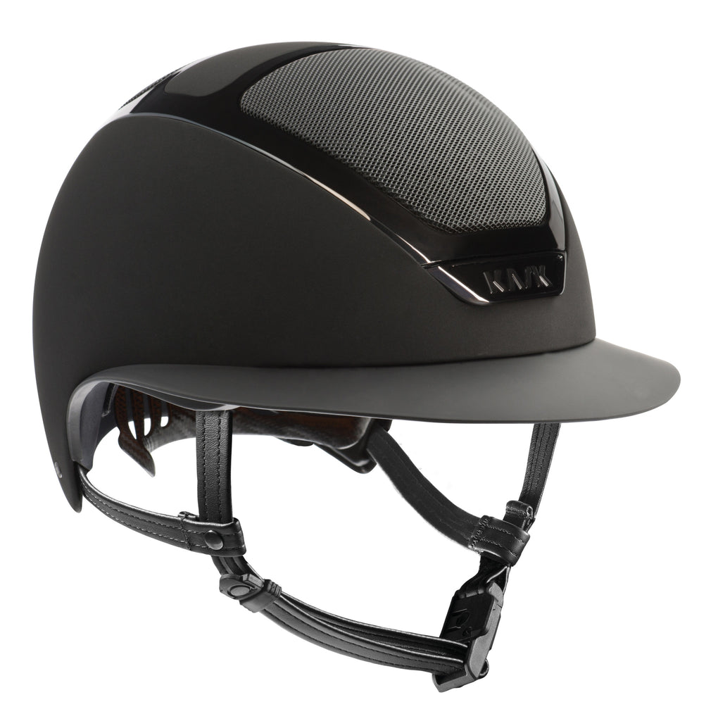 KASK’s patented self-adapting adjustment system, introduced for the first time in the equestrian market, allows the helmet to fit the rider’s head perfectly and automatically by gently cradling the back of the head. It is highly popular among the girls that tie their hair in pony tails.  The internal padding can be removed easily for washing either by hand or machine (at 30°C). The soft, eco-leather hypoallergenic chin pad helps prevent skin irritations. The fabric is easily washable, water-repellent and